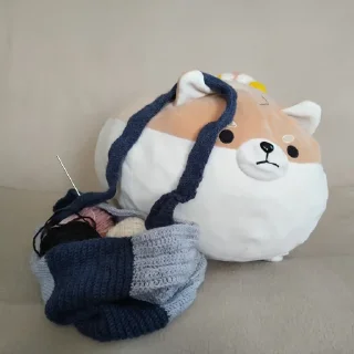 👜